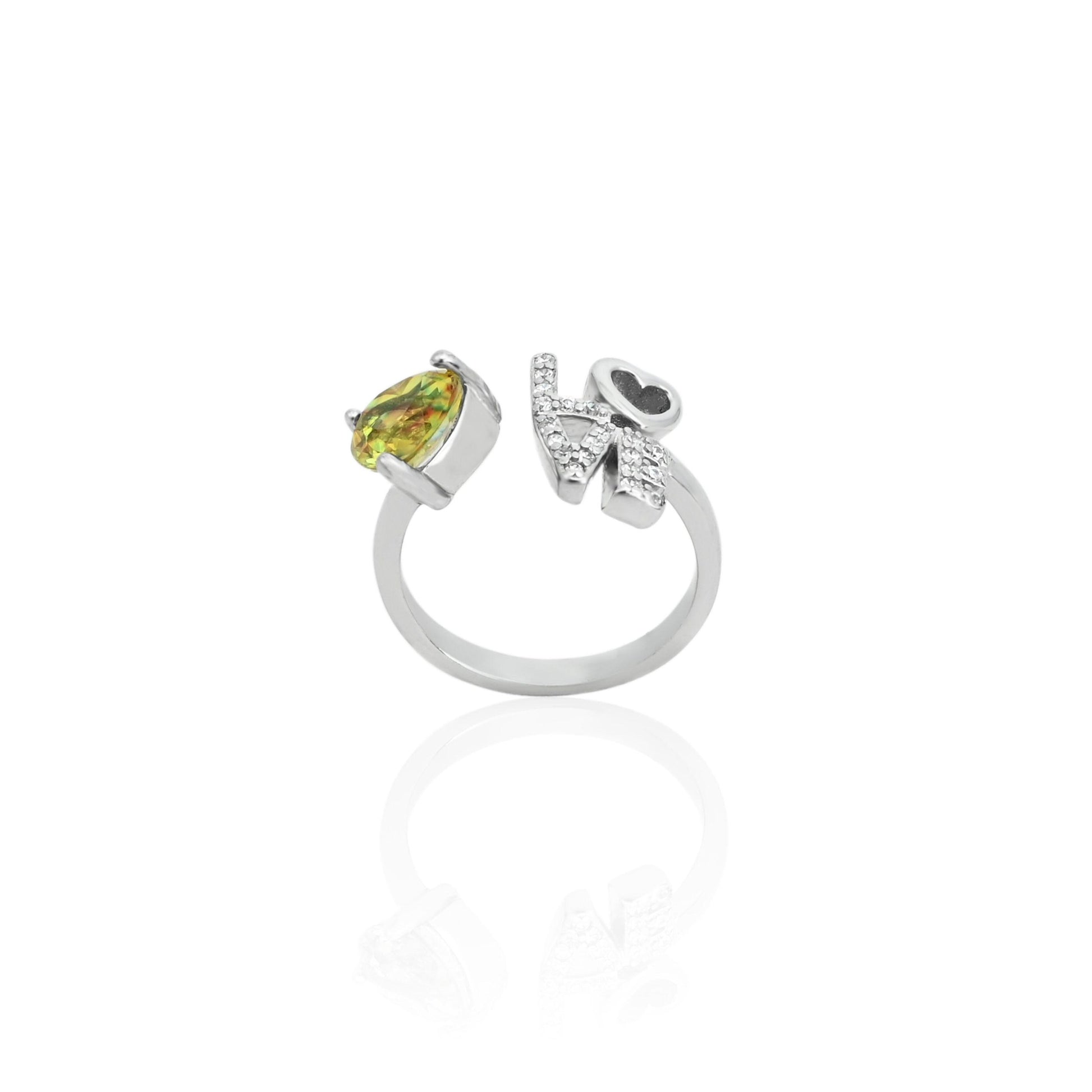 Close-up of a 925 silver love ring for women with a vibrant yellow heart-shaped gemstone.