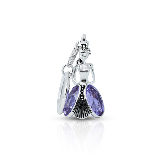 Charming silver keychain with a doll design and a vibrant purple stone for a playful touch