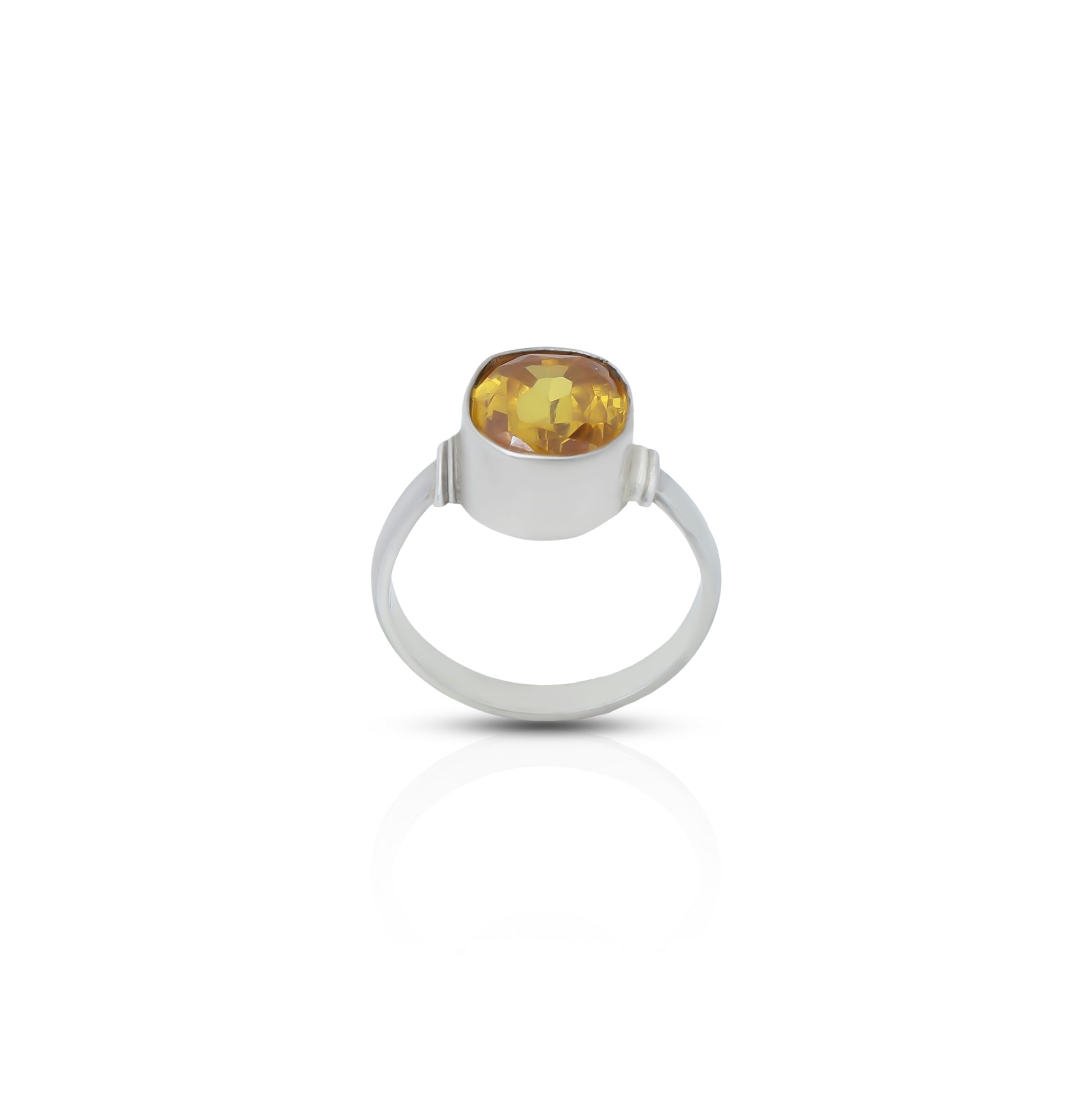 Stunning silver ring featuring a beautiful yellow sapphire.