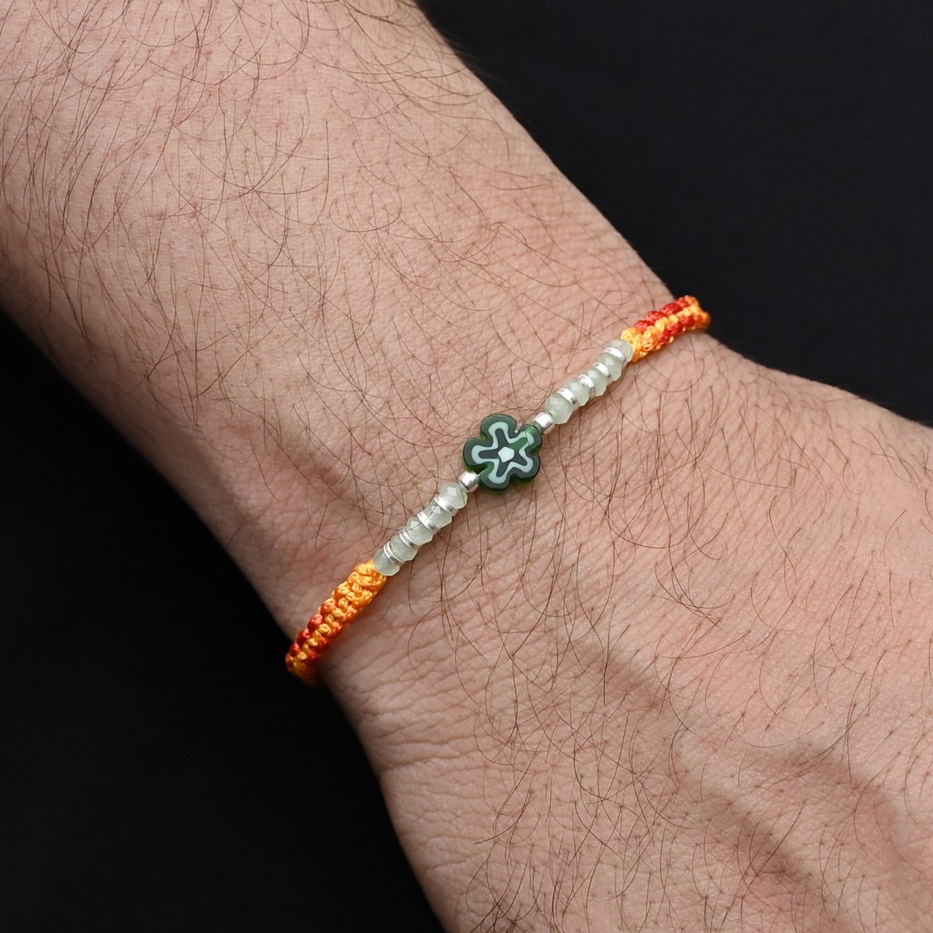 Silver Center Green Flower with Silver and Light Green Beads Rakhi for Boys
