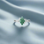 Chic 925 silver ring featuring a bright green gem for a youthful look.





