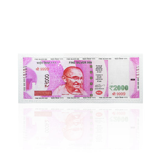 999 silver 2000 Rupee note from Khushbu Jewellers, showcasing detailed design.