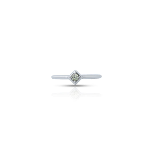 Elegant silver ring featuring a round green gemstone, perfect accessory.