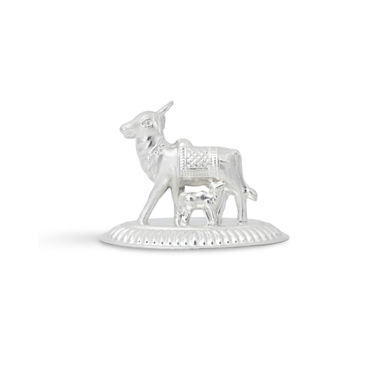 Exquisite silver cow and calf idol, perfect for puja, home decor, and as a meaningful gift.