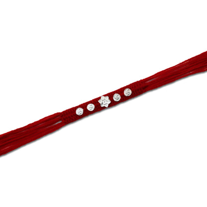 Boys' Rakhi featuring a silver flower centerpiece with a Swasthik design.