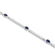 Silver tennis bracelet with a single blue stone, timeless and refined