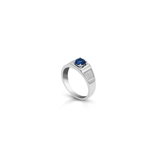 Silver ring with a petite round blue gemstone