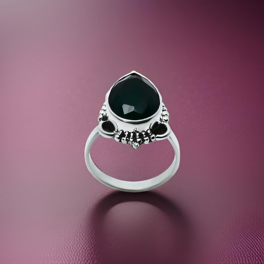 Elegant drop green gem ring in vintage silver.