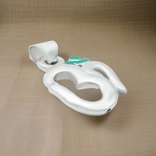 Elegant sterling silver pendant showcasing a green Om motif for peace and positivity