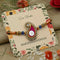 Silver Center Ganesh Ji Pink Theme with Multiple Colorful Beads Rakhi for Boys