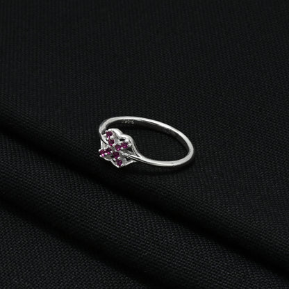 Stylish silver girls' ring showcasing minimal pink gemstones for a sleek look