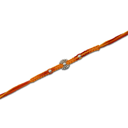 Simple yet elegant silver beads Rakhi designed for boys.