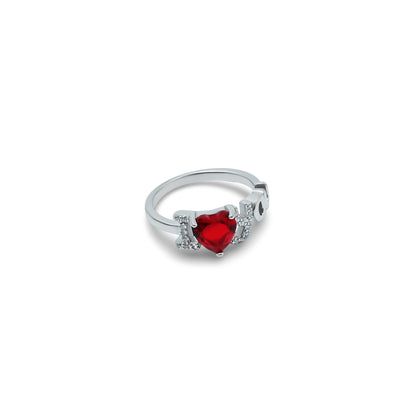 Charming red heart ring in silver setting.