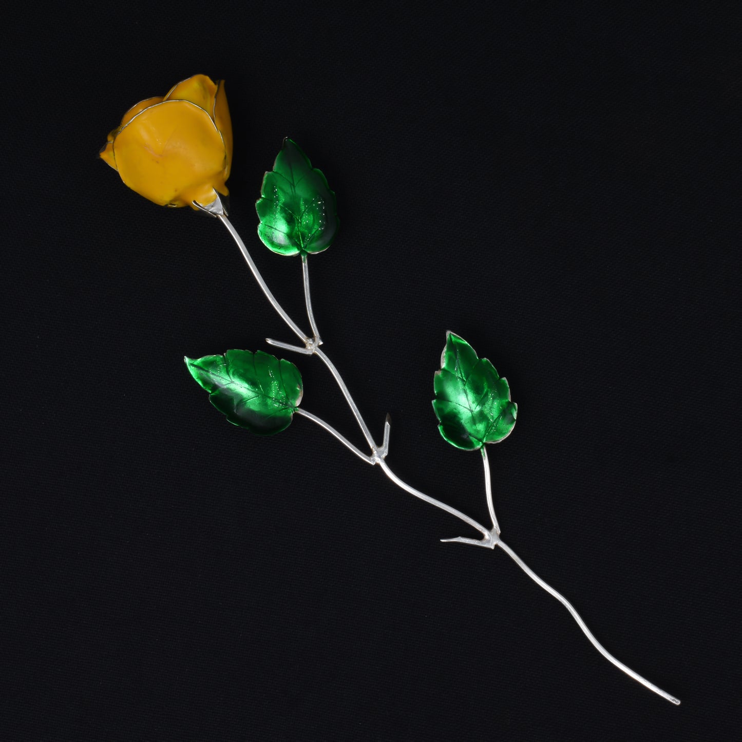 Elegant silver yellow rose with emerald green leaves, adding a touch of luxury and nature