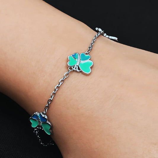 Sterling silver bracelet for girls featuring an attractive teal and blue butterfly design