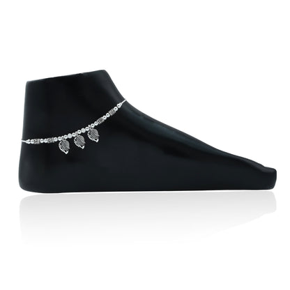 Elegant silver anklet featuring a leaf design and bead accents