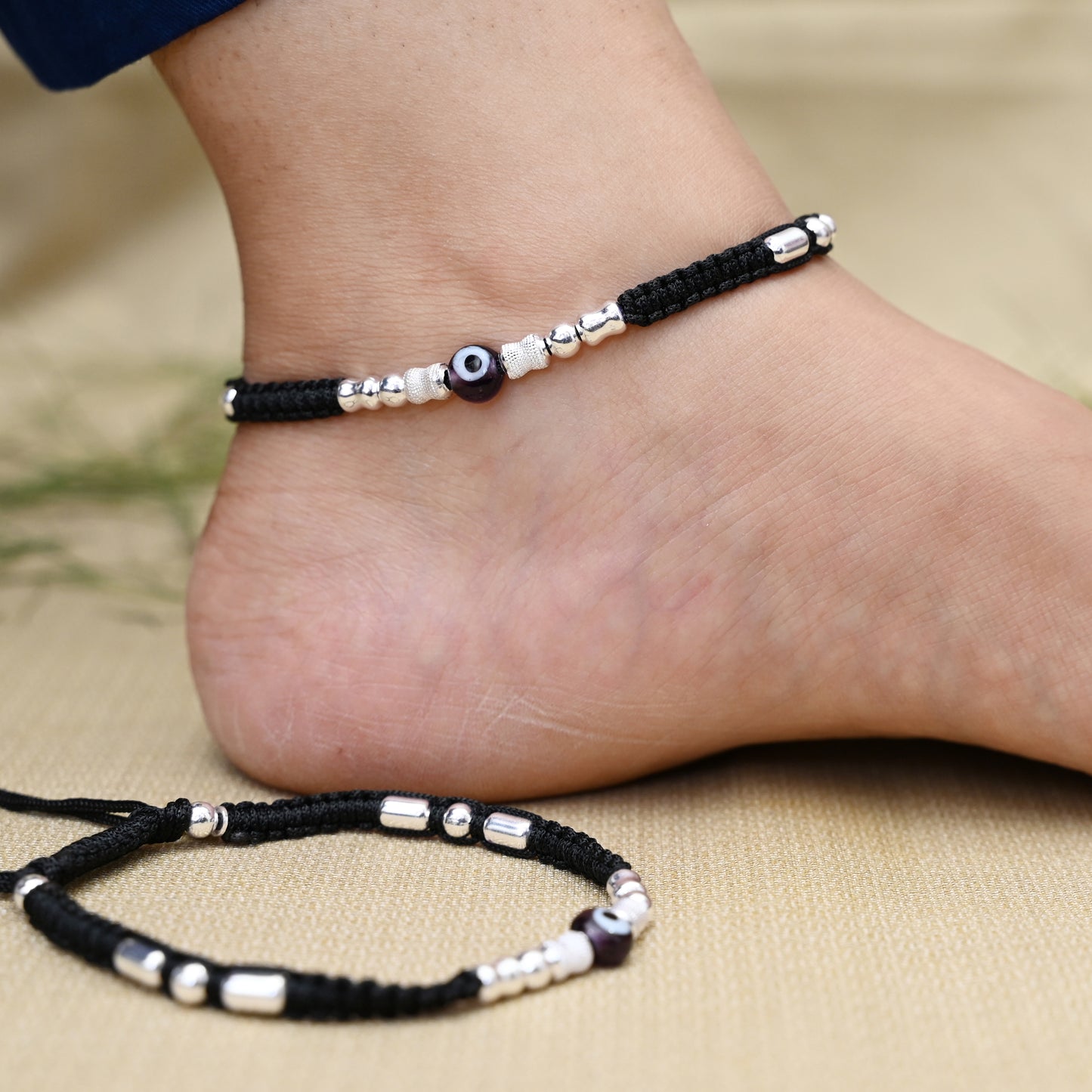 Elegant Silver Payal Featuring Black Evil Eye and Beads