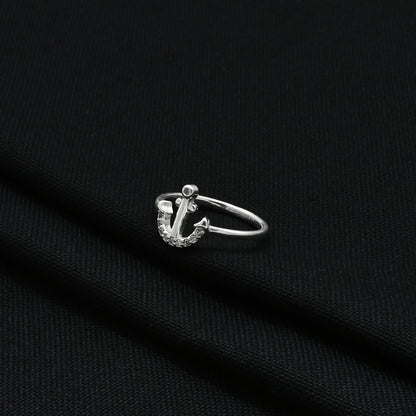 Stylish silver sterling ring showcasing an anchor symbol, perfect for a bold and symbolic look.