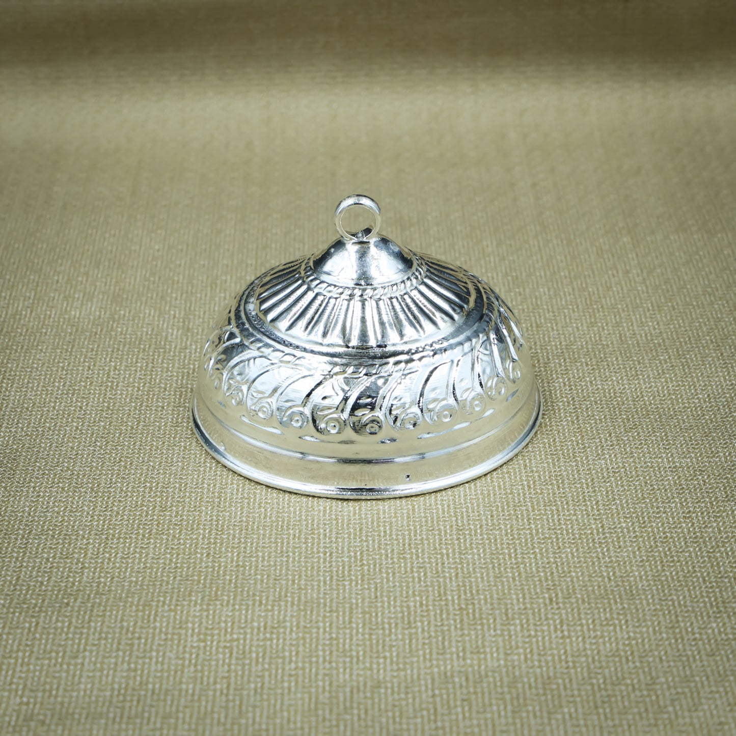 High-quality image of the beautifully designed silver chattar, symbolizing reverence and tradition in temples.