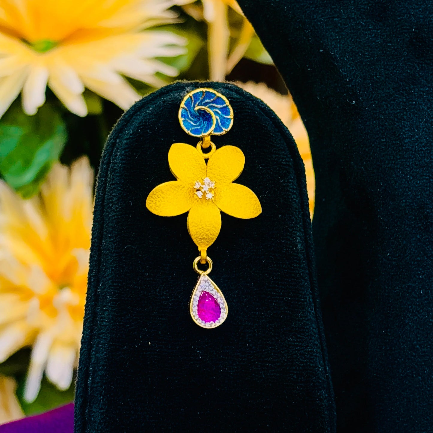 Timeless Beauty Gold Polish Silver Necklace with Gold Flower Center, Colorful Stones, and Leaf Accents.