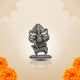 Handcrafted silver Ganesha Murti sitting on a mouse, perfect for spiritual worship and home decor.