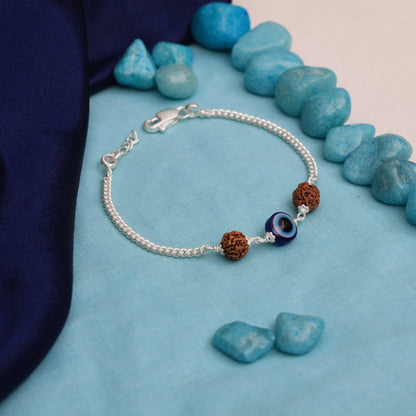 Silver evil eye bracelet with Rudraksha beads for protection and style