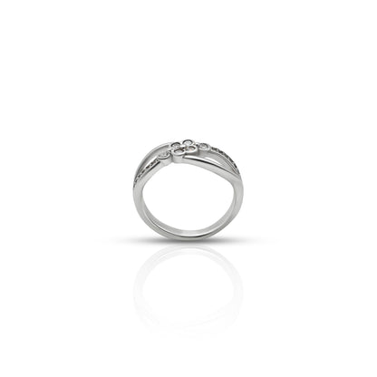 Elegant silver ring featuring floral and infinity motifs.