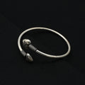 Stylish silver girls' kada showcasing a symbolized heart motif