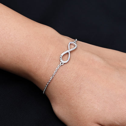 Girls' silver bracelet featuring an elegant infinity symbol in the center