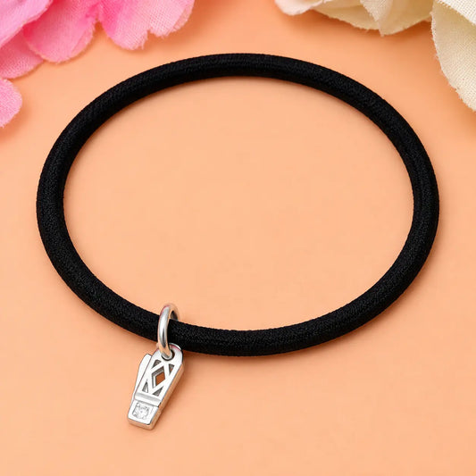 A stylish bracelet featuring a shiny silver Knife charm