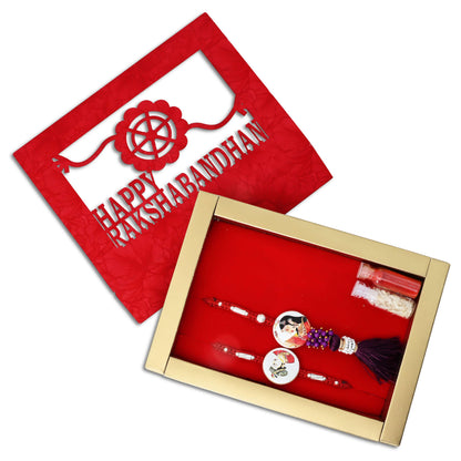 Boys' Rakhi featuring a silver Raja Rani design with a maroon theme, kumkum, and rice.