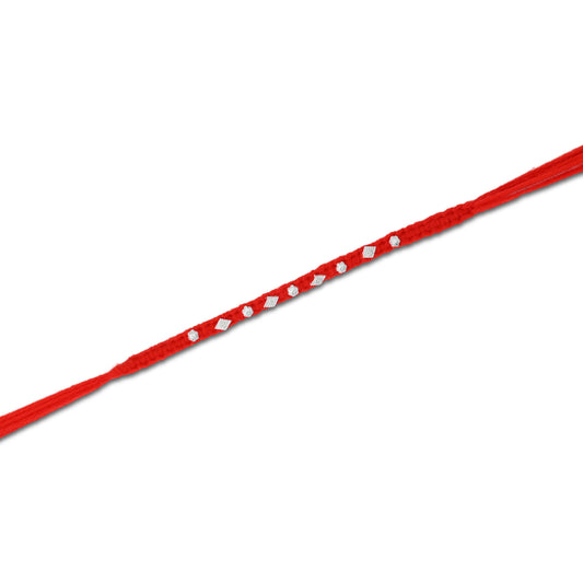 Boys' Rakhi featuring a silver small flower design with an orange thread