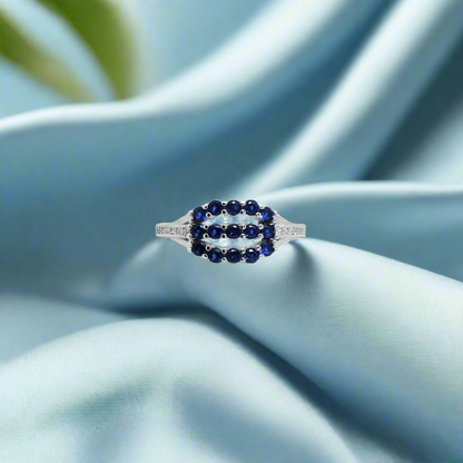 Sophisticated 925 silver ring for her, showcasing beautiful blue stones.





