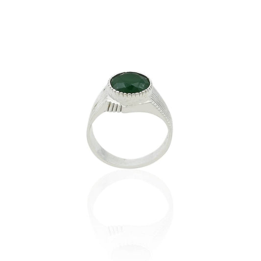 Close-up of a silver ring for men with a fancy emerald green stone, designed for a sophisticated and striking look.