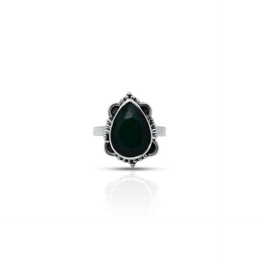 Vintage sterling silver ring with drop-shaped green gemstone.