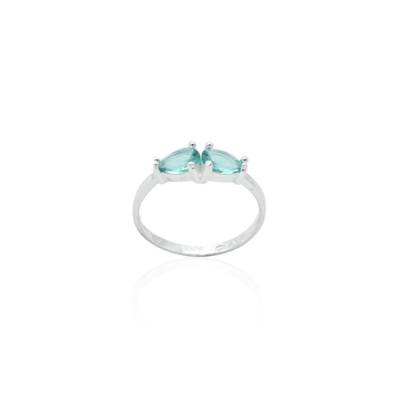 Elegant silver ring adorned with a soothing blue solitaire gemstone, offering a tranquil touch