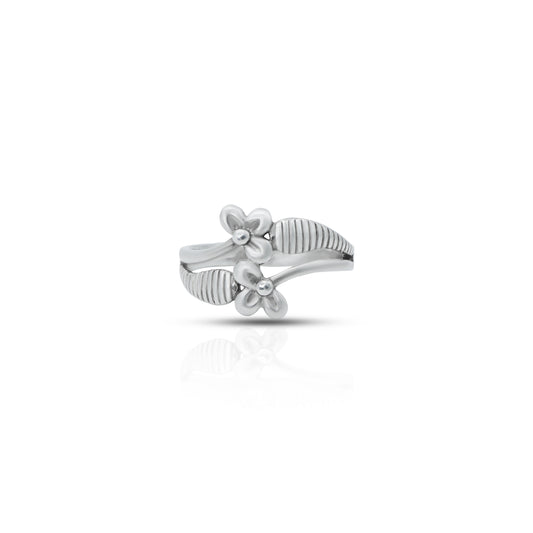 Delicate silver ring with flower design for girls.