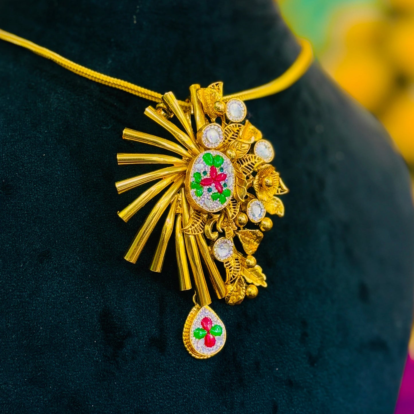 Glamorous Gold Polish Silver Necklace Set with Floral Center and Pink, White, Green Stone Embellishments.