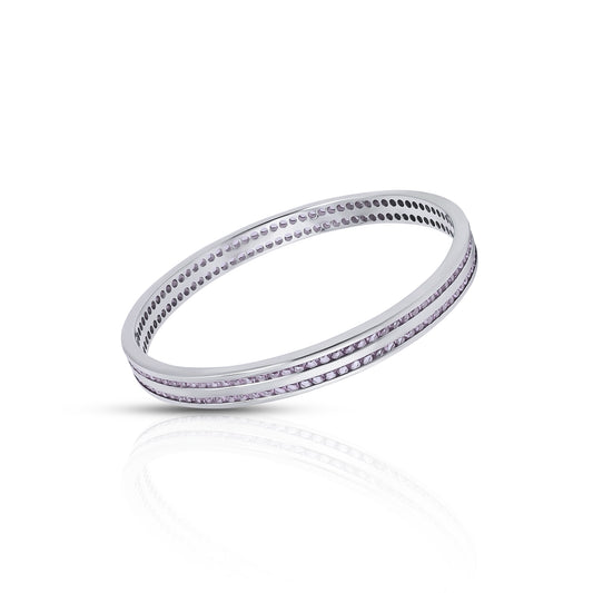 Beautiful silver bangles adorned with multiple light pink stones.