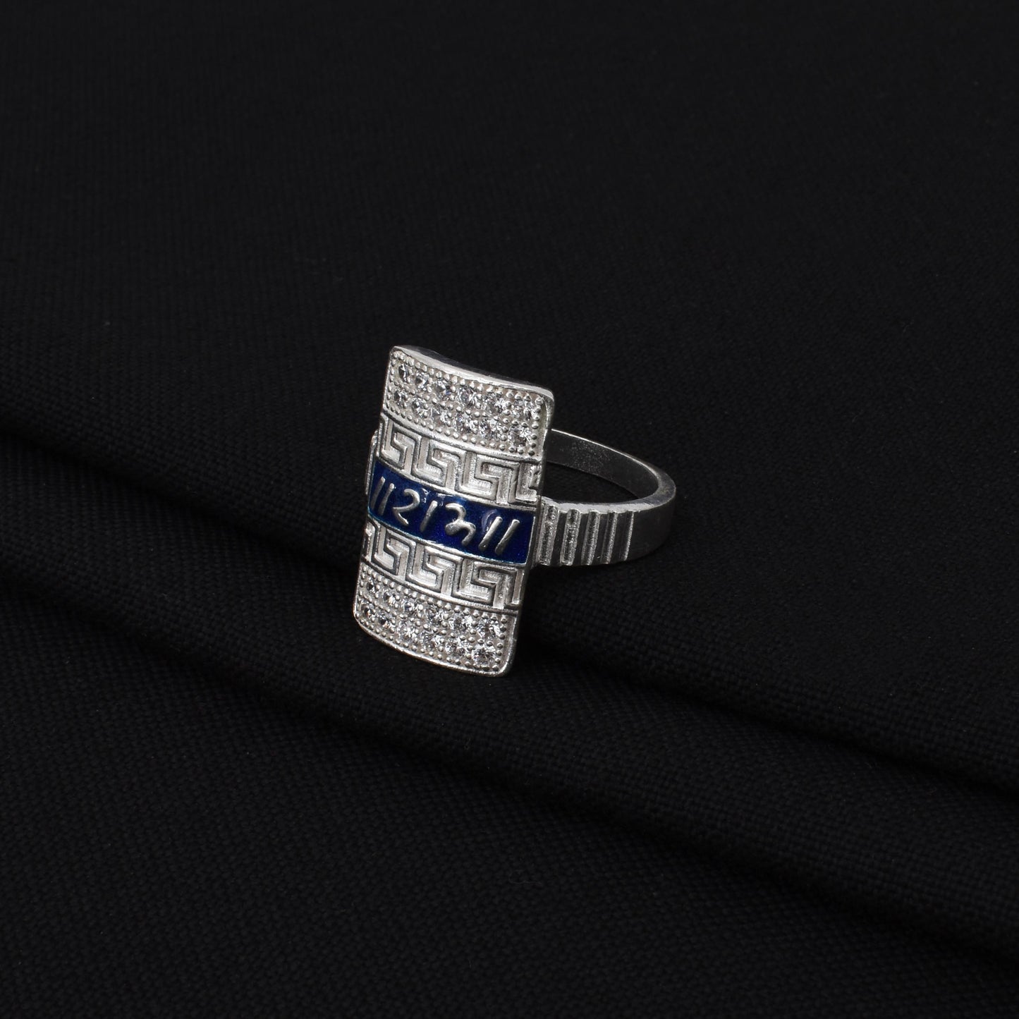 Stylish silver ring for boys with the 'RAM' symbol, symbolizing energy and determination.