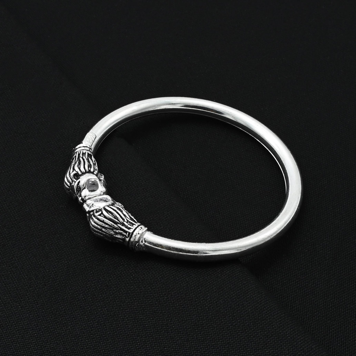 Stylish silver boys' kada adorned with a fierce lion design