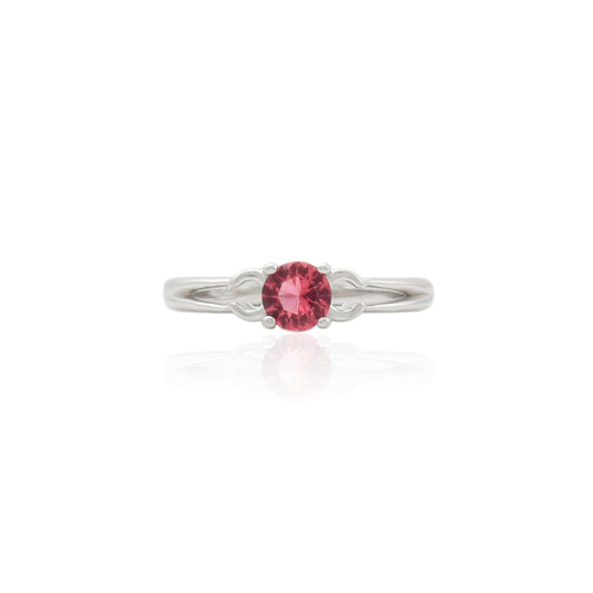 Silver girl's ring featuring a stunning pink gemstone, adding a soft and elegant touch to any outfit.