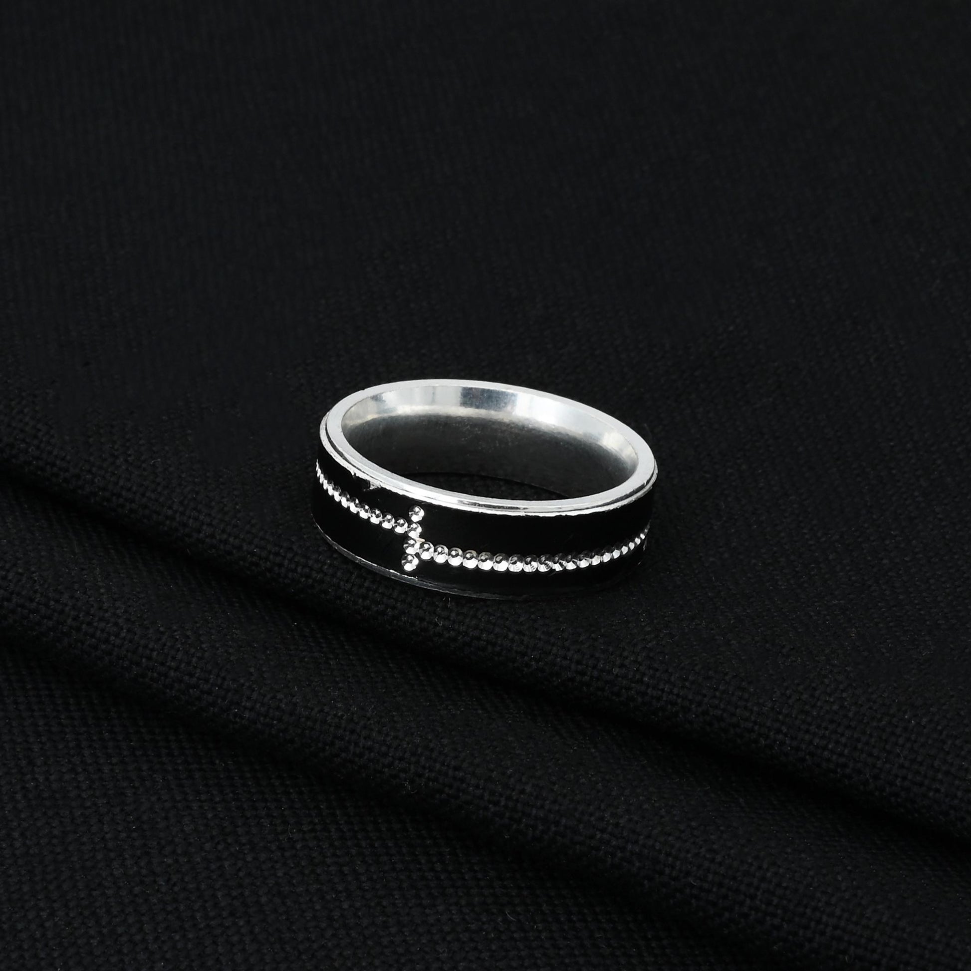 Elegant silver ring for boys showcasing a subtle and uncomplicated style.