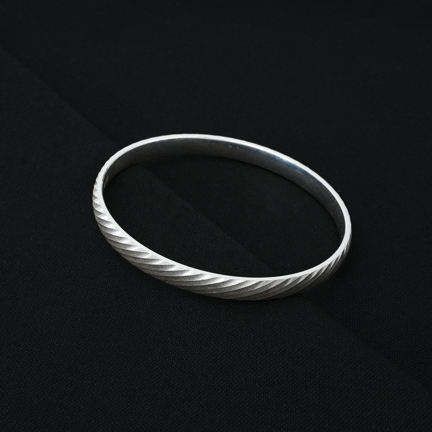 Elegant silver boys' kada offering both casual style and protection