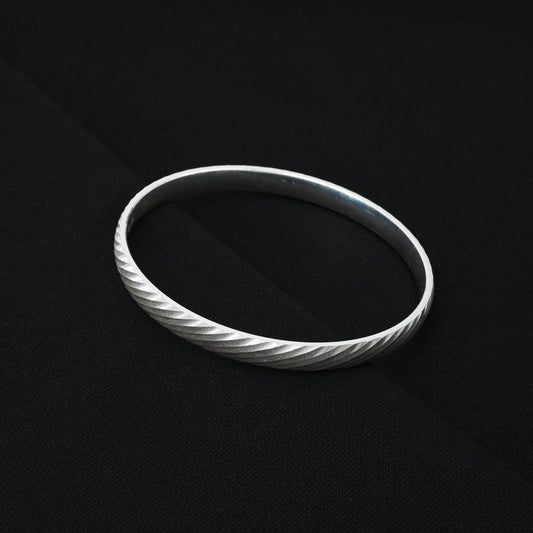 Elegant silver boys' kada offering both casual style and protection