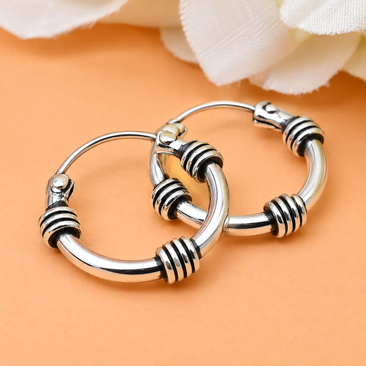 Trendy Unisex Silver Bali Earrings with Sleek Design