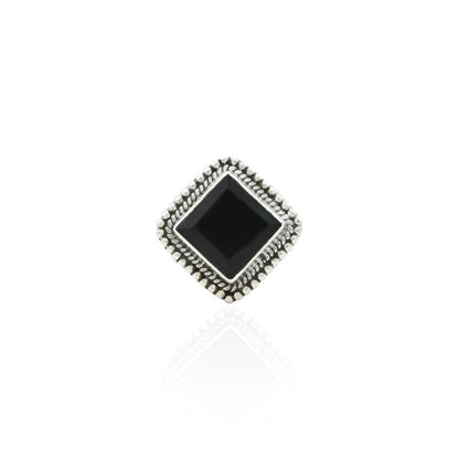 Silver ring featuring a classy design with black beads, offering a bold and elegant touch.