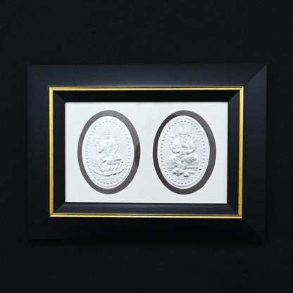 Elegant Silver Frame featuring Lord Ganesh and Goddess Laxmi