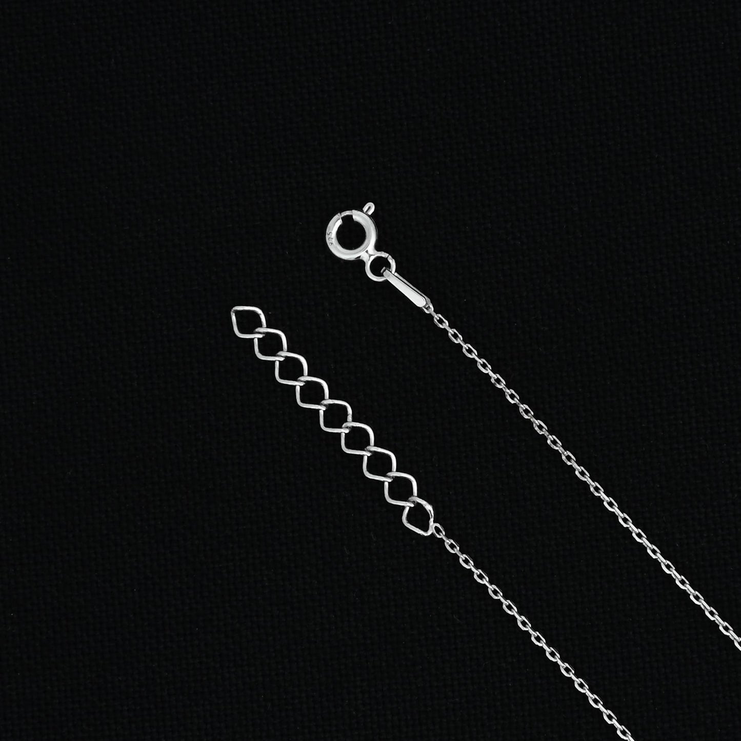 Elegant silver chain with two pendants for women.