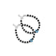 Silver bracelet featuring a light blue evil eye charm with black and silver beads